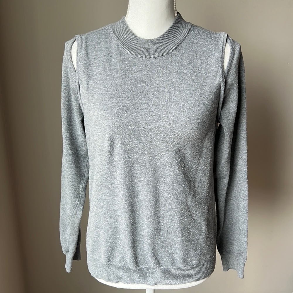 Poof! Sweater with cut outs at the shoulder